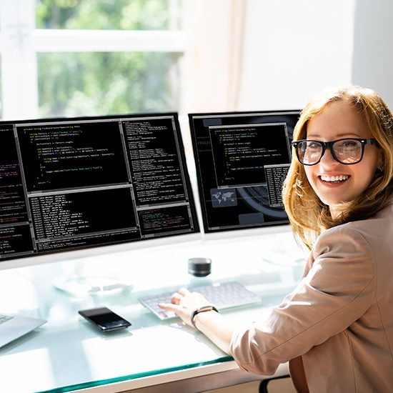 Programmer Woman Coding On Computer